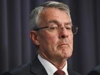 Two ministers axed in brutal internal Labor fights
