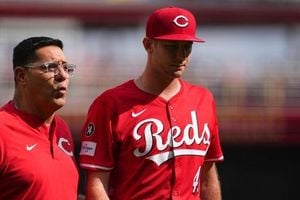 Reds Edge Pirates After Rain Delay As Playoff Drama Intensifies