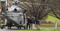 Manhunt continues in Australian bush for 'heavily armed' suspect after two officers shot dead