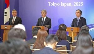 Top Diplomats Of Japan, China, South Korea Push For Cooperation