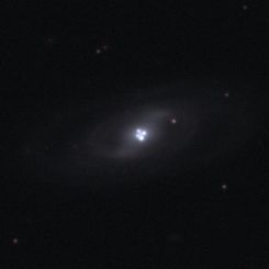 The Einstein Cross Gravitational Lens