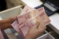 Turkish lira drops more than 2% to new low after Erdogan rival detained