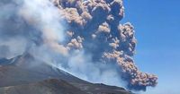 Italy's Mount Etna volcano erupts with a massive ash cloud and a 