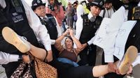 Palestine Action supporters ‘will feel full force of law’, justice minister says
