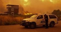 Raging wildfires ground flights at busy tourist airport amid mass evacuation