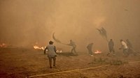 Spain continues to battle destructive wildfires even as heatwave eases