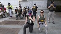FBI agents fired, including some shown kneeling during 2020 protests
