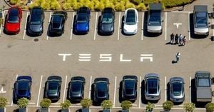 Tesla Profits Fall Again Despite Record Sales Surge