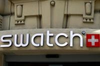 Swiss watchmaker Swatch apologizes for ad showing gesture seen as racist