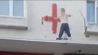 Arrest after Muslim woman racially abused by St George's flag painters