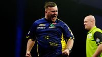 Littler hits 9-darter in final win over Van Gerwen