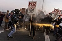 Protest of Bay Area immigration crackdown met with apparent stun grenades at Coast Guard base