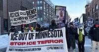 Thousands march through downtown Minneapolis protesting against ICE as state workers hold general strike
