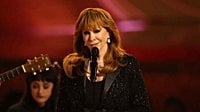 Reba McEntire Delivers Emotional In Memoriam Tribute In Her First-Ever Grammys Performance | iHeartCountry Radio