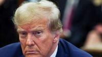 Appeals court throws out massive civil fraud penalty against President Donald Trump
