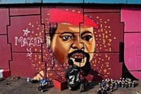 Senegalese artist transforms Conakry’s walls with captivating street art, in photos