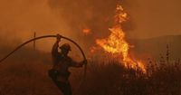 Fast-growing brush fire forces thousands to evacuate north of Los Angeles
