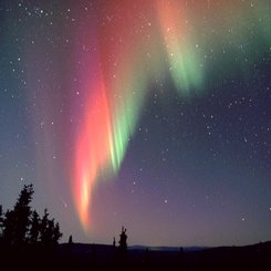 Comet and Aurora Over Alaska