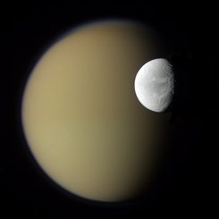 Saturn's Moons Dione and Titan from Cassini