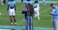 Bill Belichick's girlfriend turns heads with outfit and ‘weird' actions at UNC
