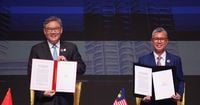 China and ASEAN, hit by US tariffs, sign upgraded free trade pact