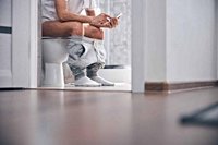 Smartphone Use On The Toilet Linked To 46% Higher Hemorrhoid Risk, Doctors Warn