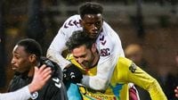Dundee 0-1 Hearts: Claudio Braga's goal and Craig Gordon's stunning save help ten-player Jambos maintain dominance at Scottish Premiership summit