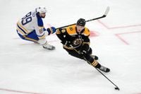 Sabres score in final seconds, beat Bruins in overtime