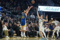 Stephen Curry, Jimmy Butler lead Warriors past Bucks, 120-113
