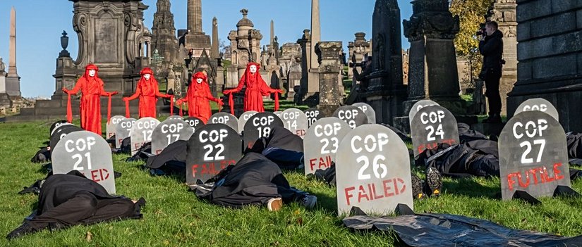 Birleşmiş Milletler İklim Değişikliği Konferansı'nda tutulmayan sözlere ve "göz boyamaya" tepki çeken bir görsel.