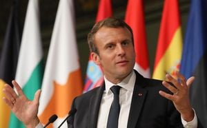 Macron Warns Of Russian Threat While Critics Call For Calm