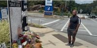 Many CDC workers working remotely, some returned Thursday to pay tribute to slain officer