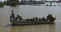 Rescue boat evacuating flood victims capsizes in eastern Pakistan, killing 9