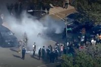 13 Chicago police exposed to tear gas after responding to crash