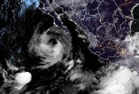 Hurricane Priscilla moves along Mexico in the Pacific as Tropical Storm Jerry churns in the Atlantic