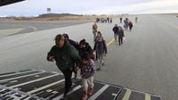 Tears and Uncertainty Amid Mass Evacuation in Western Alaska