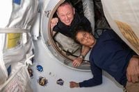 Who are the NASA astronauts who have been stuck in space for 9 months?