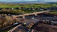First trains run across new £60 million bridge as West Coast Main Line reopens - Rail UK