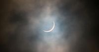 How to see a partial solar eclipse turn the sun into a crescent