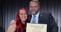 Flint-area letter carrier honored for saving girl from dog attack