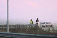 7 shots of police searching for man who escaped from prison van on M55