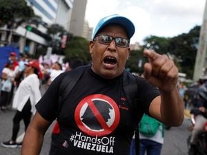 US Warships Approach Venezuela Amid Escalating Tensions