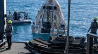 Flipping for joy! Dolphins greet NASA astronauts back to Earth after splashdown