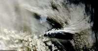 Most enduring, biggest iceberg breaks apart, more splintering to come in death spiral