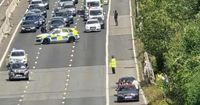 Multi-car crash causes busy motorway to close - live updates
