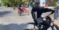 'Serious disorder' in city as '60 youths block road' and car seen in flames