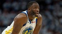 Timberwolves ejected fan, search for another who directed racial slur at Draymond Green