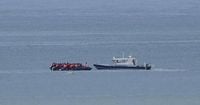 First migrants arrive in UK from France under the 'one in, one out' policy