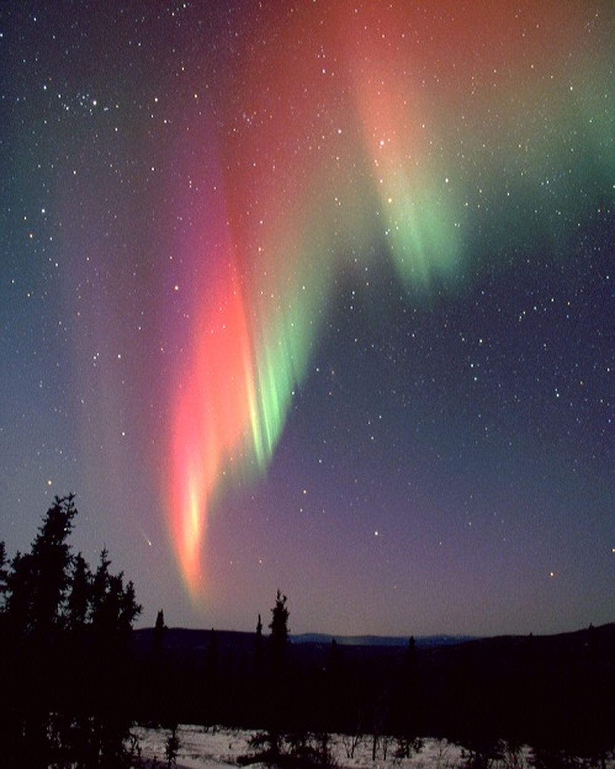 Comet and Aurora Over Alaska