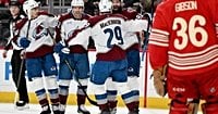 MacKinnon scores twice to become the 1st 40-goal scorer of the season, Avalanche blank Red Wings 5-0